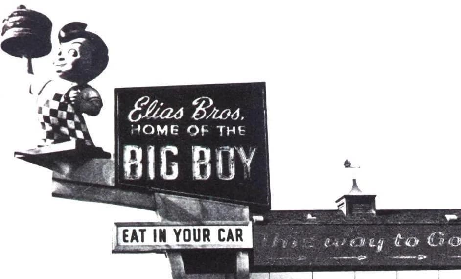 An illuminated Elias Brothers “Home of the Big Boy” sign.